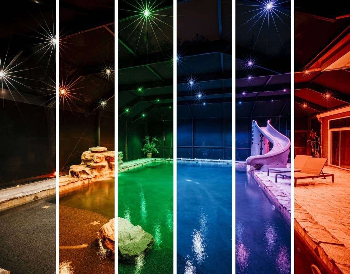A nighttime pool courtyard appears in vertical color bands—warm orange, green, blue, and purple—creating a vivid, surreal atmosphere.